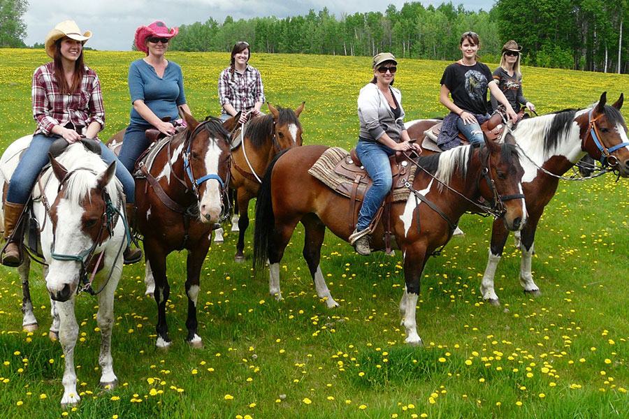 classic cowgirl wellness retreats cowgirls riding field